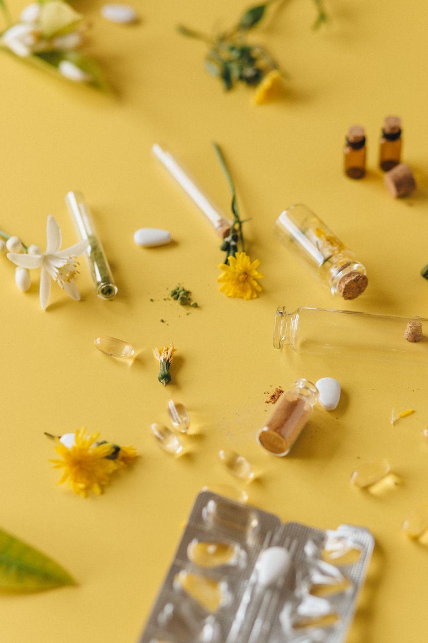 An assortment of fresh natural ingredients like ginger, honey, and herbs representing a collection of natural remedies.